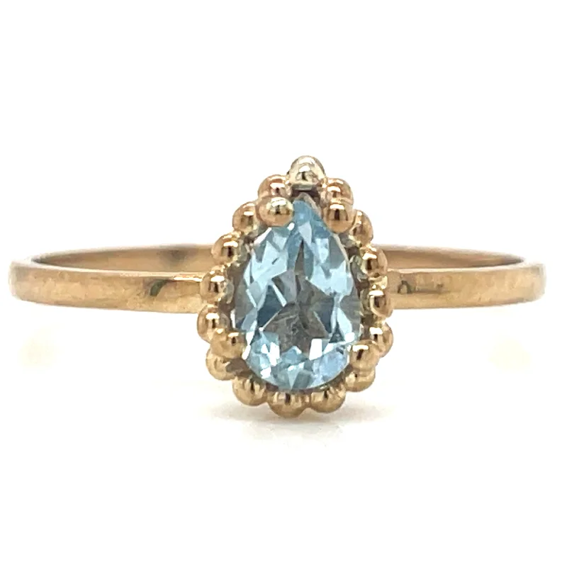 9ct Yellow Gold Earth Grown Pear Cut Blue Topaz Ring with Dotted Edge