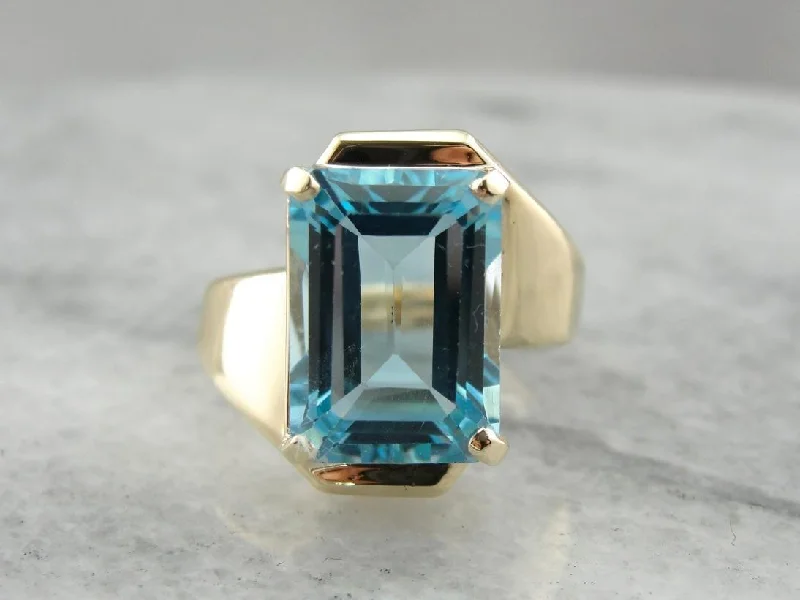 Sleek Modernist Blue Topaz Bypass Ring